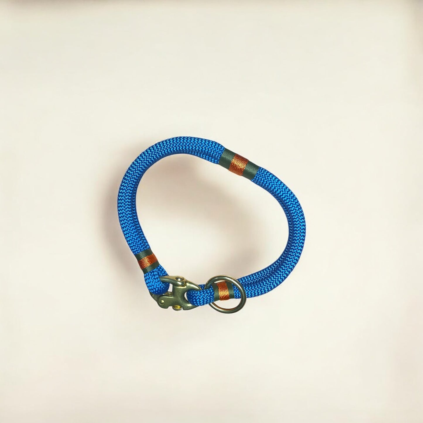 Greenwich Yarn Soho Edition handmade rope dog collar in petrol blue with brass shackle and o-ring, luxury custom dog accessory inspired by London.