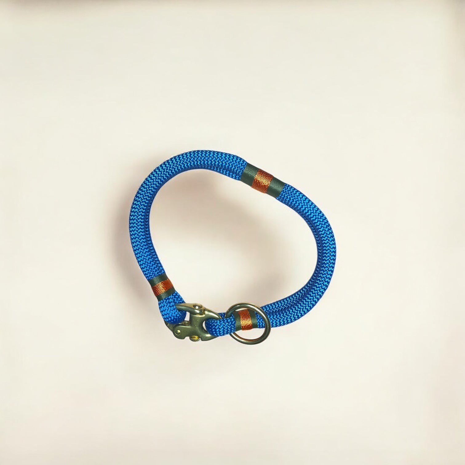 Greenwich Yarn Soho Edition handmade rope dog collar in petrol blue with brass shackle and o-ring, luxury custom dog accessory inspired by London.