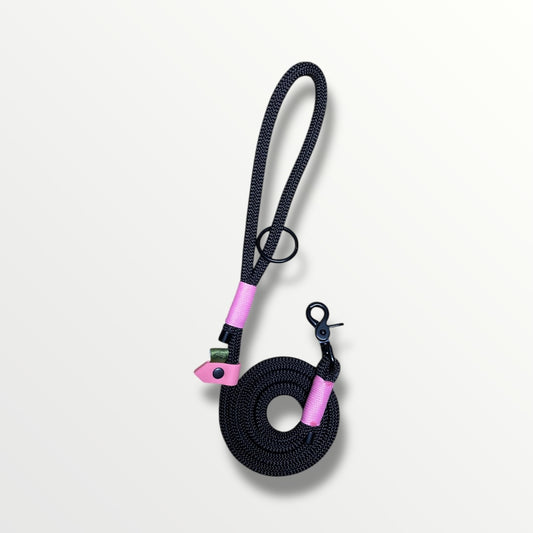120cm rope lead in black rope with pink binding and slider, finished with black hardware.